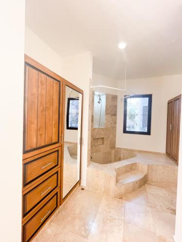 Third bathroom over roman tub