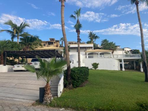 Looking up entry stairs towards patio and pool